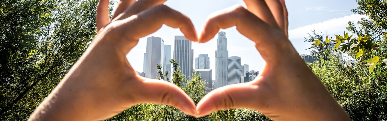 Los angeles downtown, artistic composition with woman drawing heart